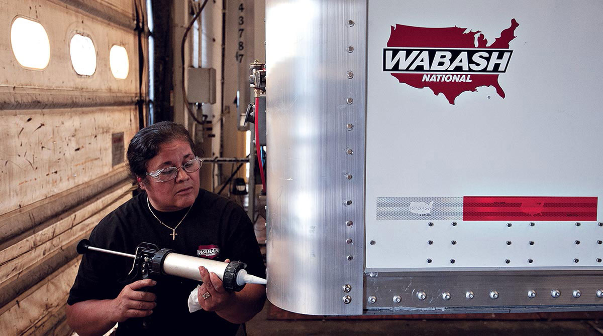Wabash factory employee works on a trailer