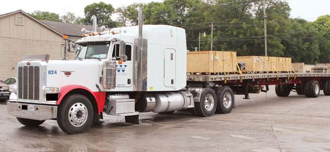 The flatbed truck of an Alabama-based trucking company.