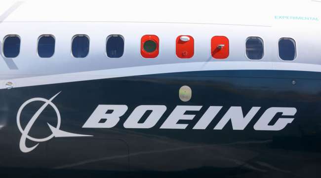 A Boeing 737 Max sits on the tarmac in Farnborough, U.K., in July 2018. (Simon Dawson/Bloomberg News)