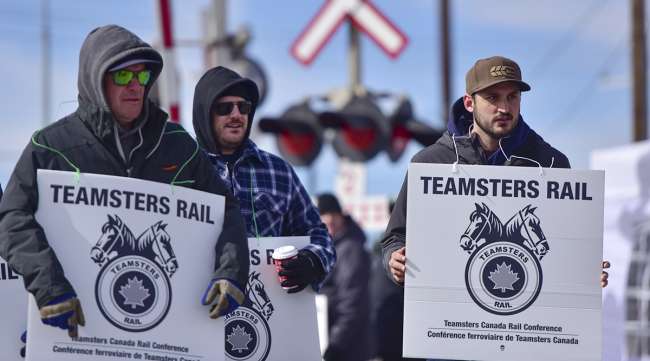 Workers demonstrate during a Canadian Pacific Railway strike in Calgary