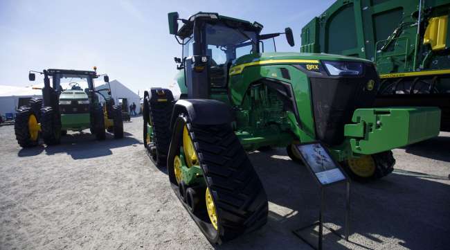 Deere & Co. John Deere tractors are displayed during the World Agriculture Expo in California on Feb. 11.
