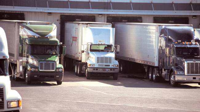 Truck drivers waiting at a loading dock