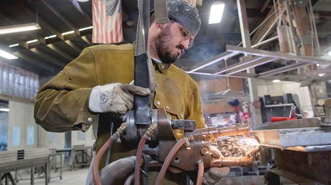Factory Output Rises More Than Forecast