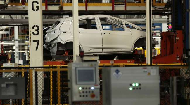A Chevrolet Bolt vehicle sits on the assembly line at GM's plant in Orion Township, Mich.