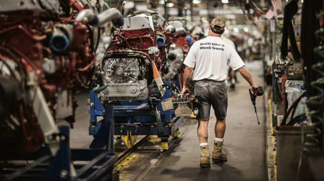 Worker at a Mack plant