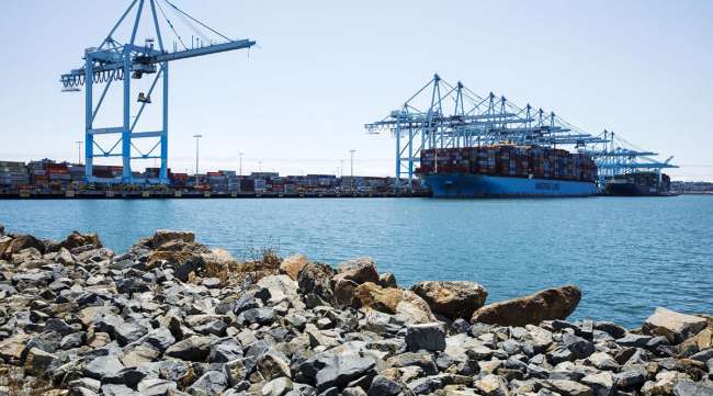 A Maersk ship unloads containers at the Port of Lost Angeles