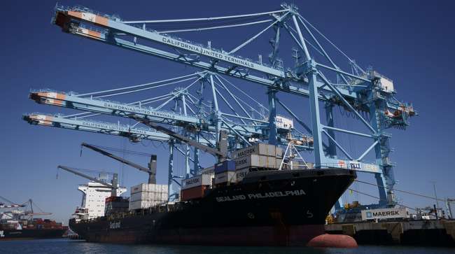 Cranes unload Maersk containers at the Port of Los Angeles