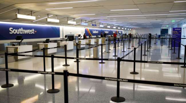 A Southwest Airlines check-in area at a nearly empty terminal in LAX.