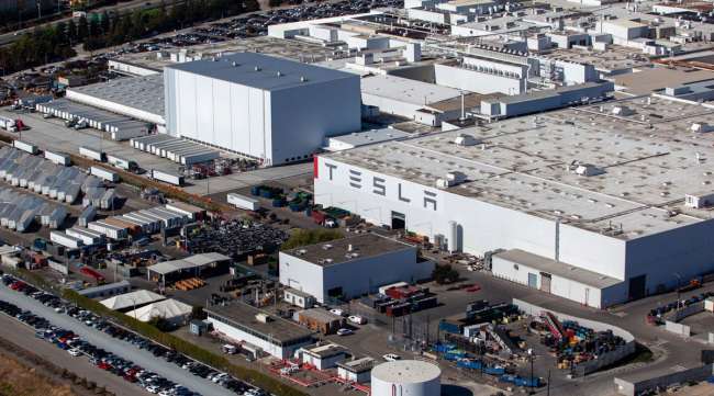 The Tesla assembly plant stands in Fremont, Calif.