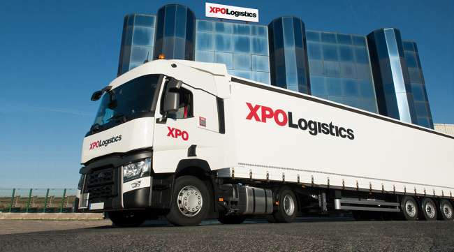 XPO Logistics truck in front of company headquarters