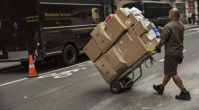 UPS employee delivers packages in New York City