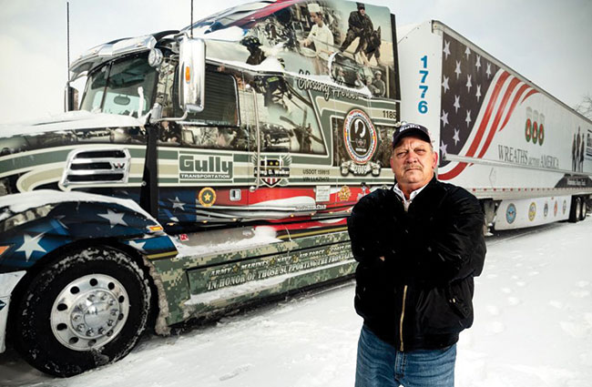 J.D. Walker with Gully Transportation Wreaths Across America-branded truck