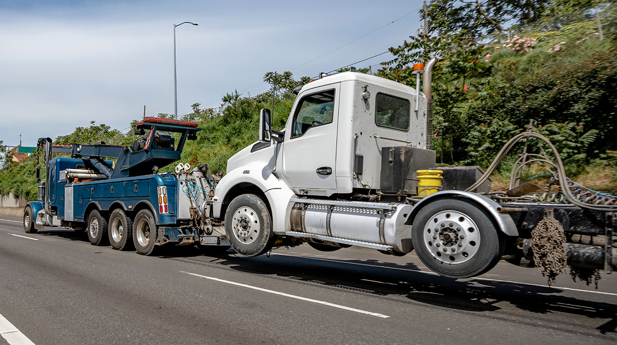 Getty Image of semi truck being towed