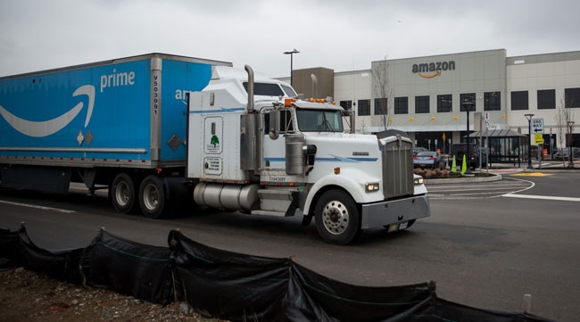 A truck operates outside an Amazon warehouse in Staten Island, N.Y. (Michael Nagle/Bloomberg News)