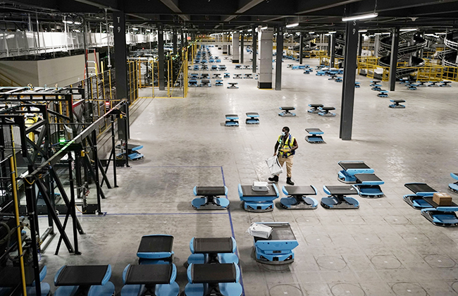 Robots transporting packages at the Amazon Air Hub in Cincinnati.