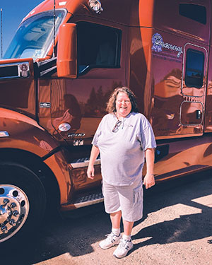 Susan Dawson standing with truck