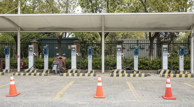 An electric vehicle charging station stands empty in Shanghai, China.
