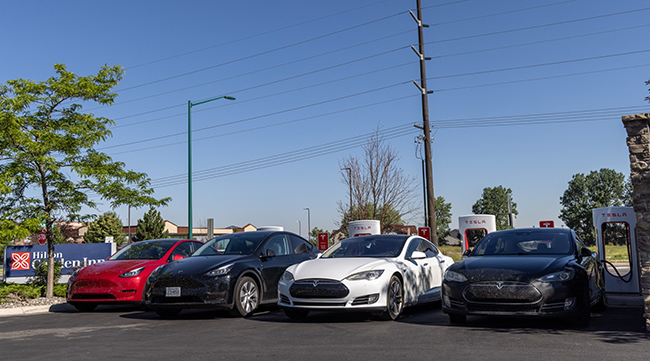 Electric vehicles at a Tesla Supercharger location