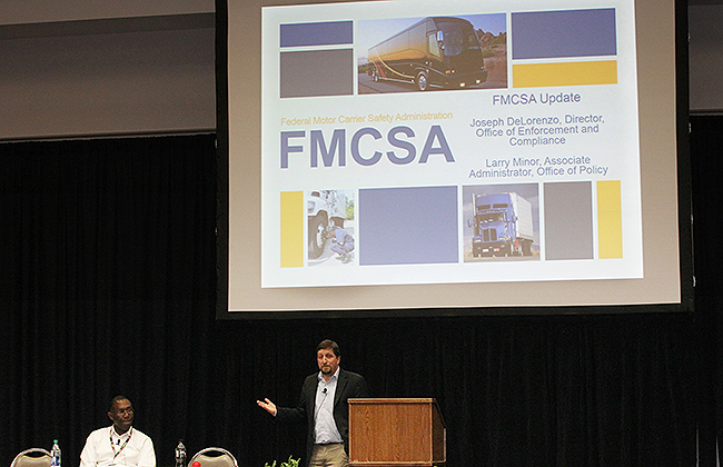 FMCSA's Joe DeLorenzo is dwarfed by a projection screen at a MATS update session.
