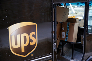 Packages sit inside a UPS truck