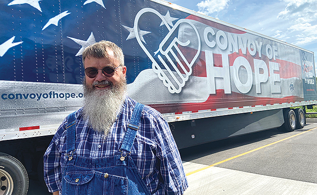 Gene Woolsey with a Convoy of Hope truck