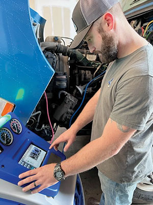 Technician conducts diagnostic test on HVAC unit