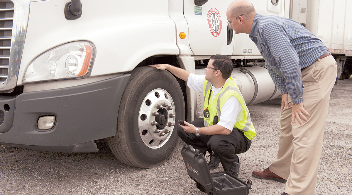 Tires being inspected on a truck 