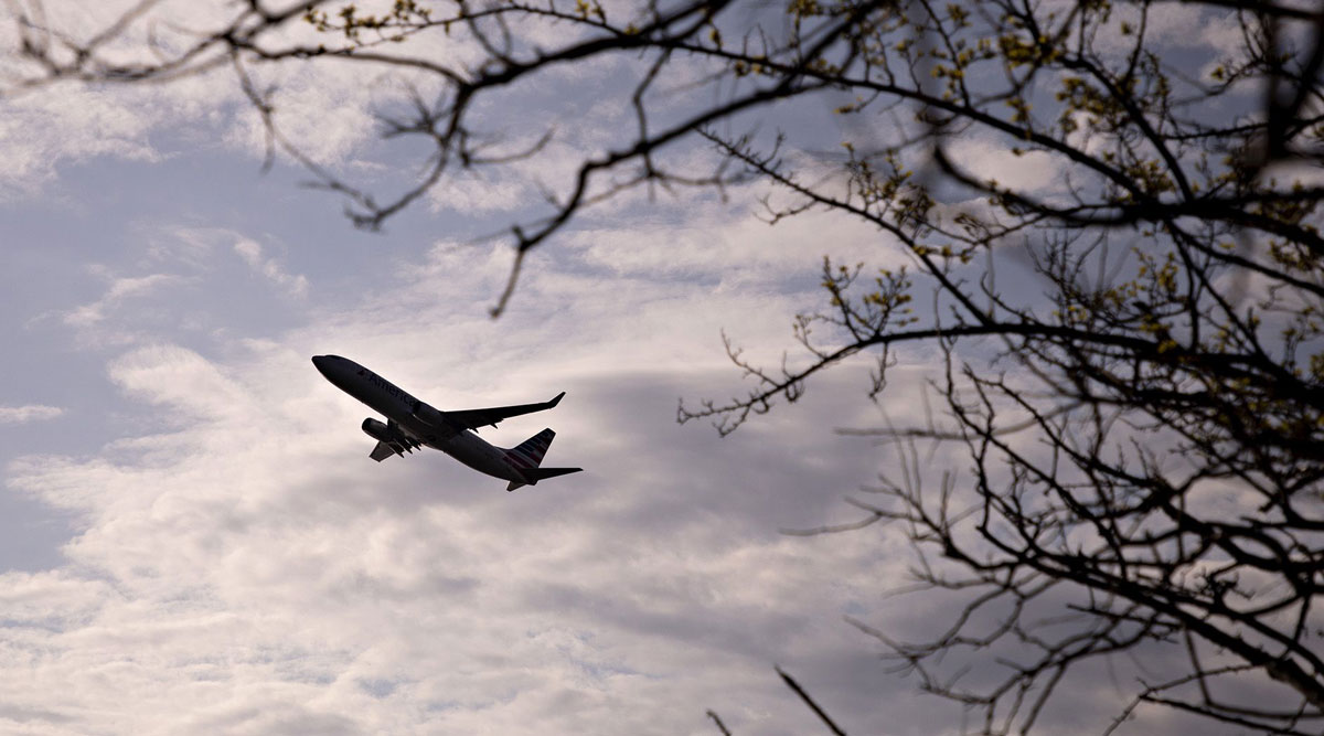 A plane departs Reagan International Airport in Arlington, Va., on April 6.
