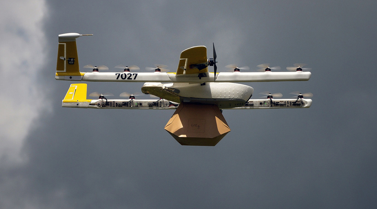 An Alphabet Inc. Google X Project Wing delivery drone flies during a demonstration at Virginia Tech