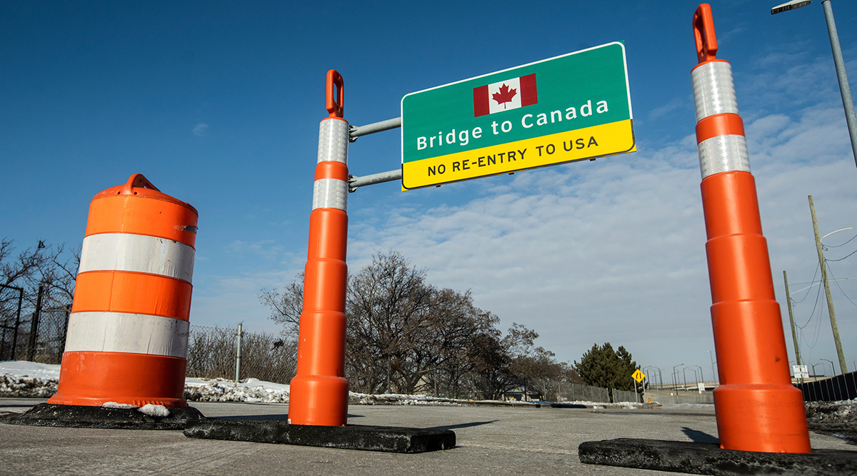 Cones block an entrance to the Ambassador Bridge entrance to Canada