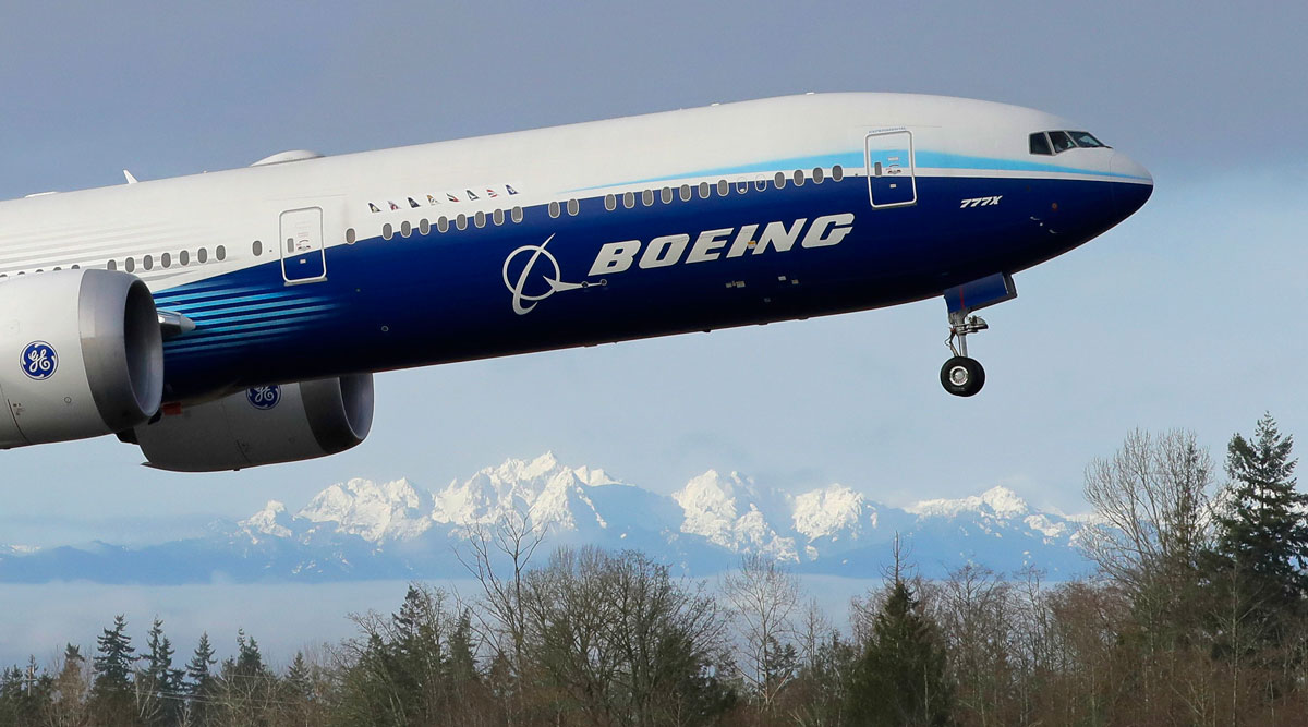 A Boeing 777X takes off on its first flight in Everett, Wash. 