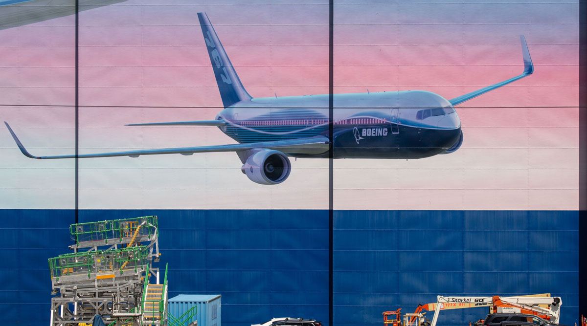 A plane image is seen on the outside of Boeing's facility in Everett, Wash.