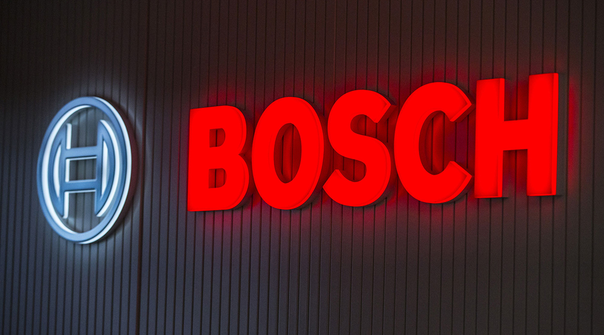  The Bosch logo sits illuminated on a wall at the Robert Bosch GmbH digital factory in Stuttgart, Germany