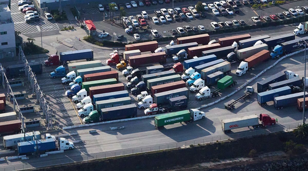  Trucks enter and exit the Port of Los Angeles on Nov. 16.