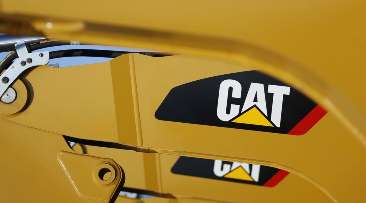 Caterpillar backhoe excavators are displayed for sale at a dealership in Kentucky on Jan. 27.