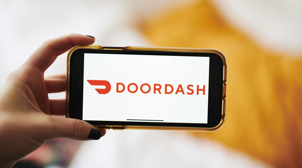 Doordash's logo is displayed on an iPhone. (Gabby Jones/Bloomberg News)
