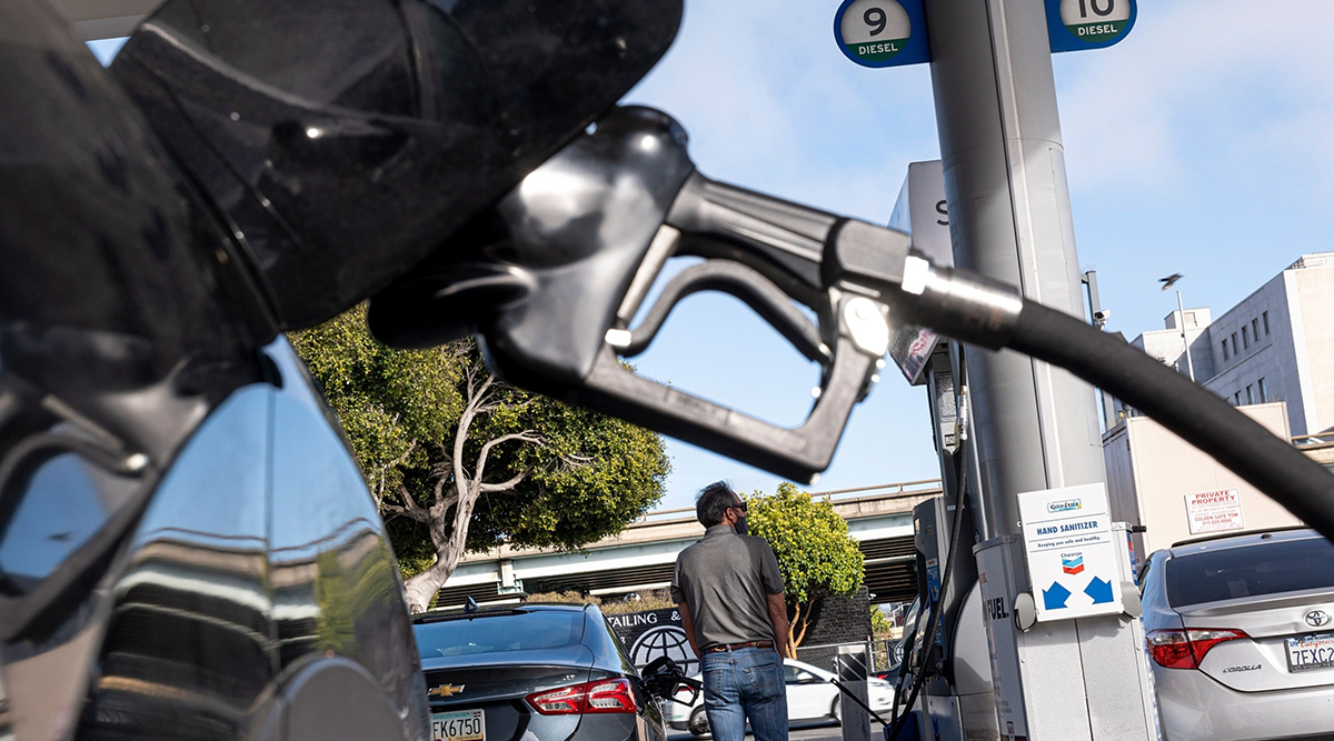 Customers refuel at a Chevron Corp. gas station in San Francisco