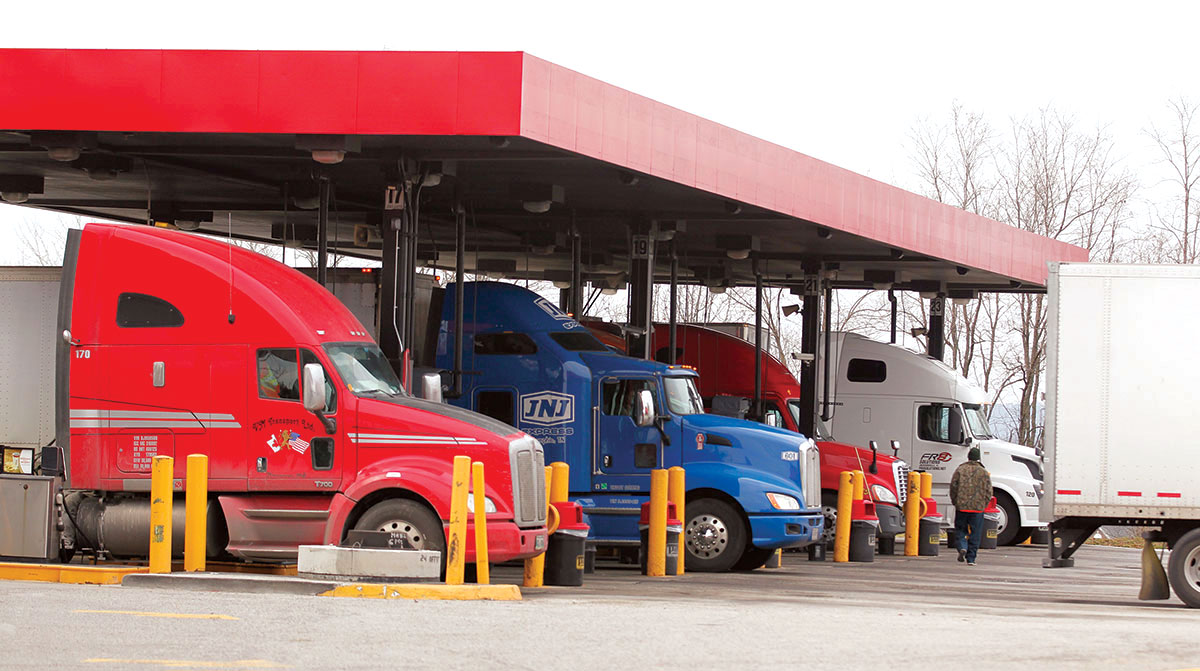 Trucks fueling at a service station