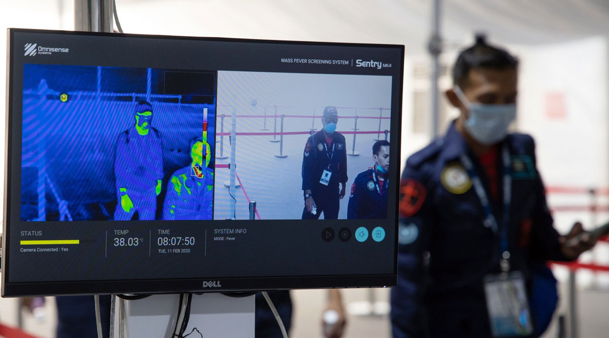 A monitor displays a thermographic image to detect abnormal temperatures in attendees at the Singapore Airshow on Feb. 11.
