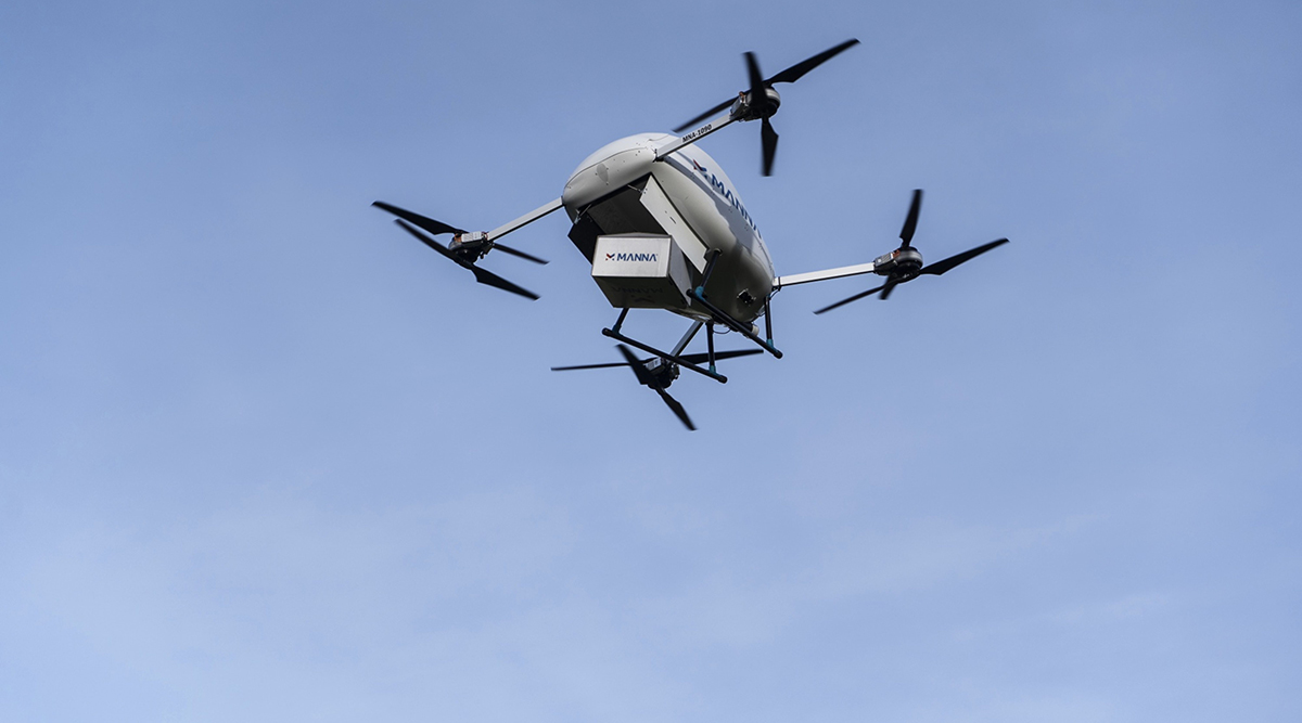 A Manna Aero drone delivers a parcel during a flight demonstration in Dublin, Ireland
