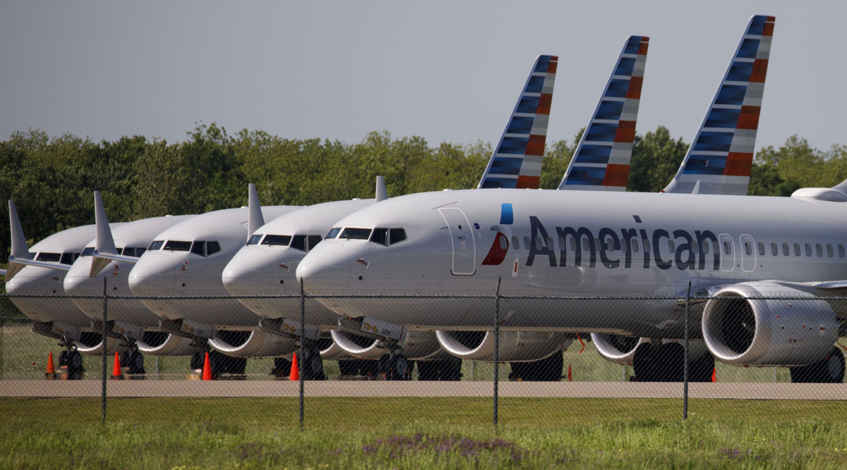 American Airlines Boeing 737 Max planes sit parked outside a hangar in Tulsa, Okla., in May 2019.