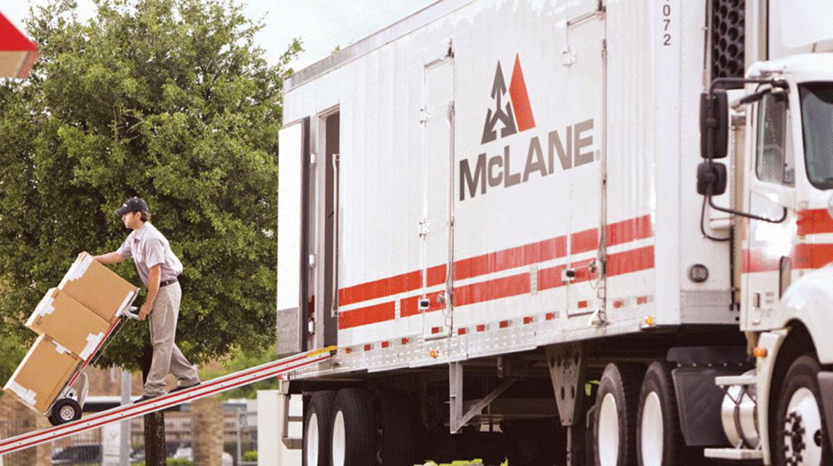 McLane driver making delivery