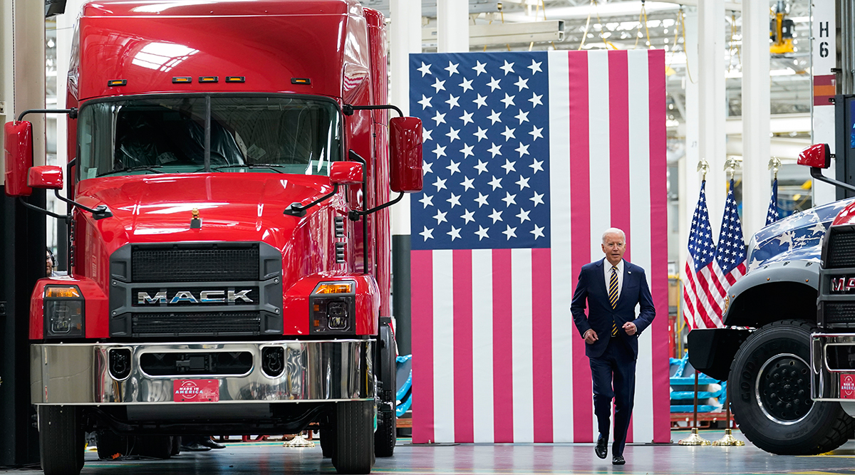 President Biden moves toward the podium to speak at the Mack Trucks plant in Macungie, Pa. 