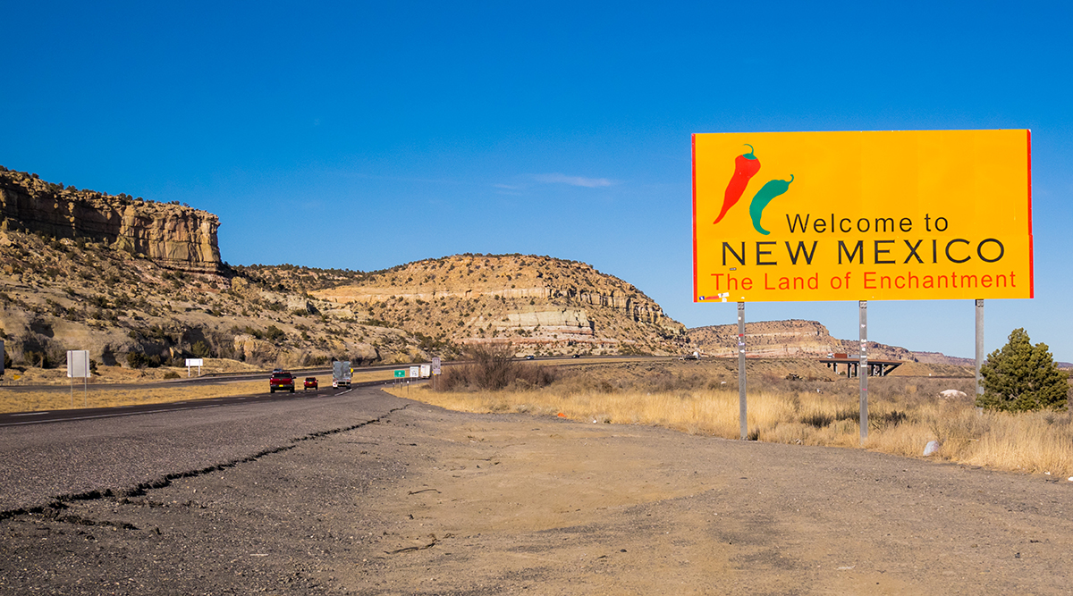 Welcome to New Mexico sign near a highway