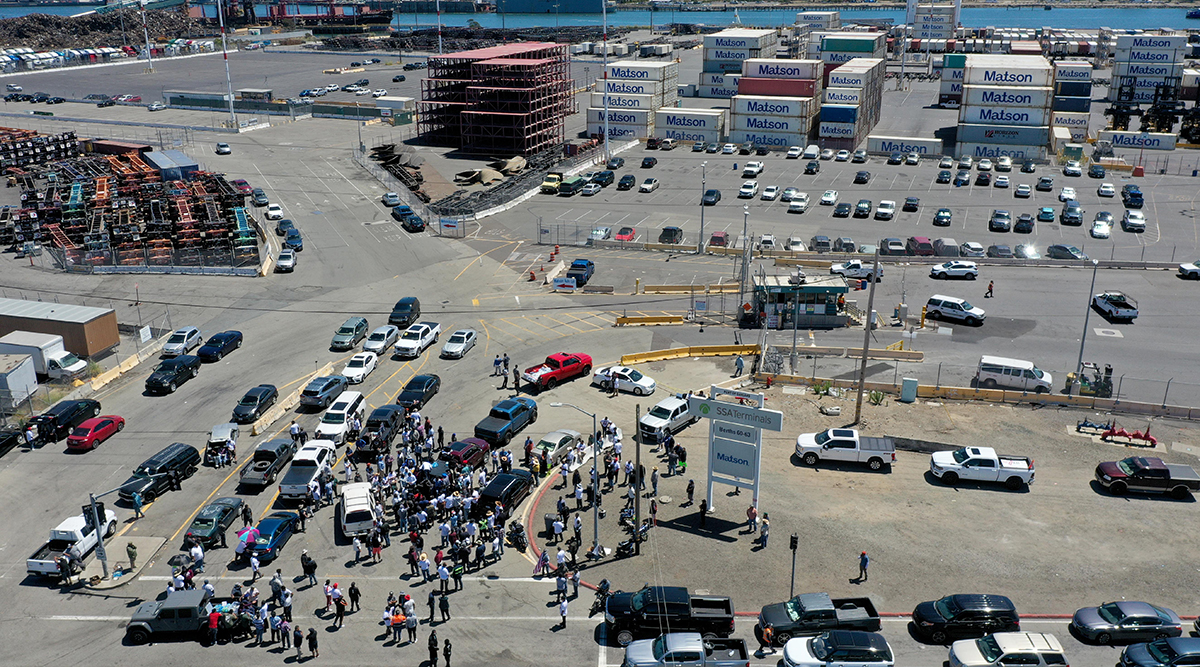 Truckers rally during a protest in front of Matson shipping at the Port of Oakland