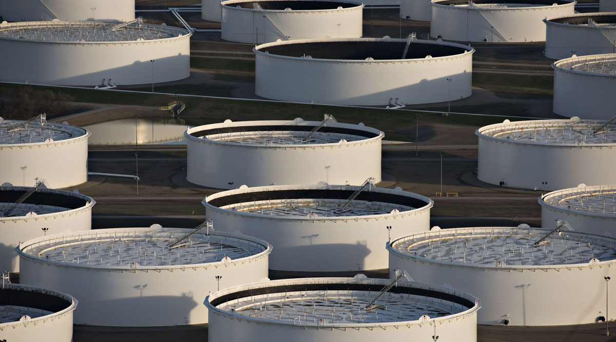 Oil storage tanks stand in Cushing, Okla.