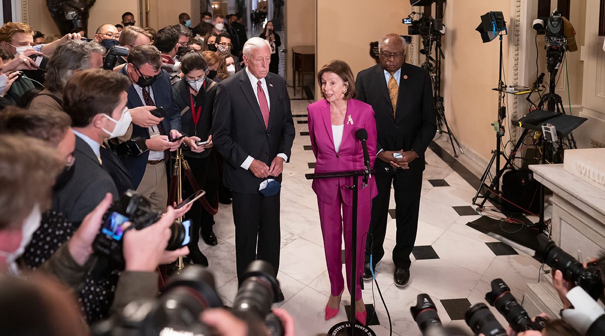 House Speaker Nancy Pelosi meets with the press during a break in Friday's discussions