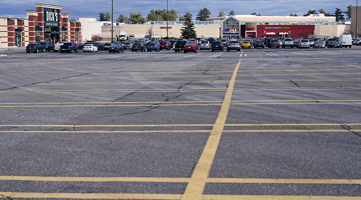 Nearly empty strip mall parking lot