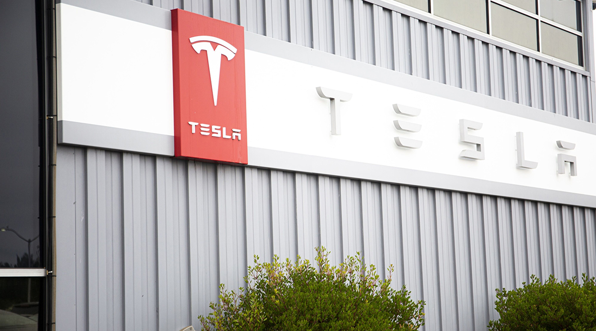 Tesla Inc. signage is displayed outside the company's factory in Fremont, Calif.