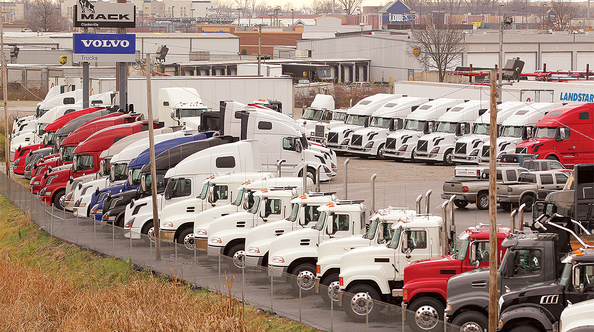Mack trucks on a dealers' lot